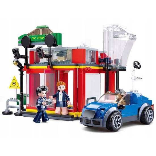 Zestaw budowlany Sluban – warsztat samochodowy, klocki, samochód sportowy i mini-figura mechanika
