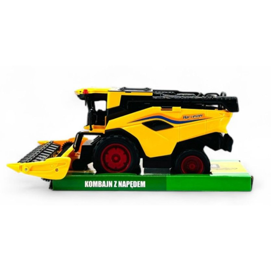 Zabawka kombajn rolniczy z napędem – żółty harvester z boku na zielonej podstawce