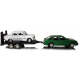 Metalowe modele PRL Polonez Caro i Fiat 125p na dwuosiowej lawecie marki Welly w skali 1:34