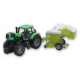 duży traktor z prasą rolującą